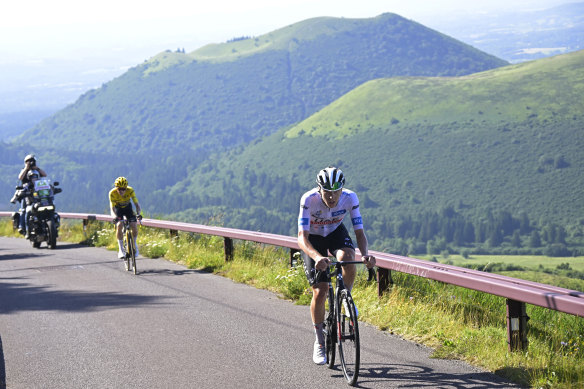 Tadej Pogacar rides away from Jonas Vingegaard as they approach the summit on stage nine.
