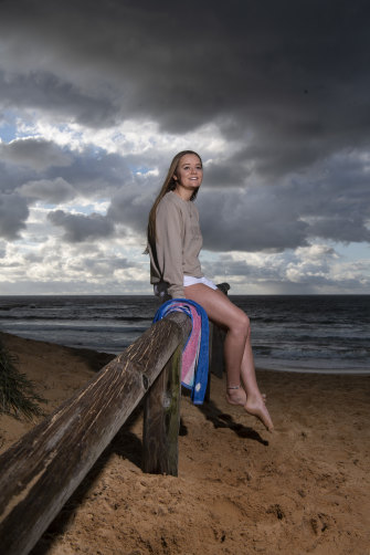 Student Alex Carroll, 19, at North Curl Curl beach. She’s passionate about volunteering with the elderly.