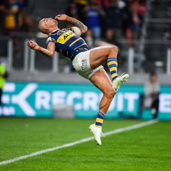 Flipping out: Blake Ferguson performs a back flip after scoring a spectacular try in the Eels win at Bankwest Stadium.