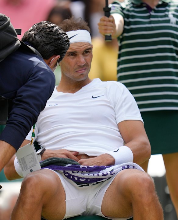 Rafael Nadal withdrew from his Wimbledon semi-final with an abdominal injury.