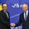 Malaysia’s Prime Minister Anwar Ibrahim, left, meets Russia’s Vladimir Putin in Moscow on Wednesday.