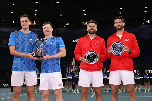 Henry Patten of Great Britain and Harri Heliovaara of Finland pose with the championship trophy alongside runners up Simone Bolelli and Andrea Vavassori of Italy following the Men’s Doubles Final.