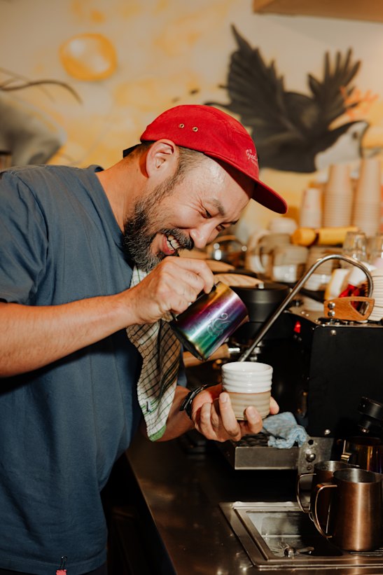 Diggy Doos cafe owner Paul Lee making coffee. 