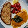 Curry omelette and roasted tomatoes .