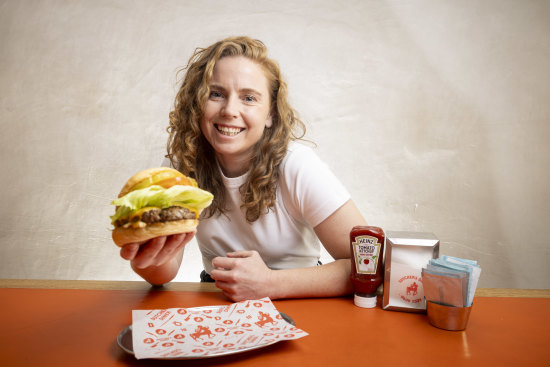 Bronwyn with her beloved cheeseburger at Butcher’s Diner.