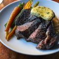 Scotch fillet with “Nan’s potato bake” at The Iron Yampi.