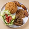 Jollof rice with beef and fried plantain.