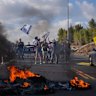 Hundreds of thousands of Israelis, desperate to end Gaza war, flood streets and block highways