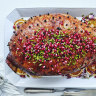 Pomegranate and pistachio glazed ham.