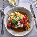 Fish with tomatoes, harissa and fennel.