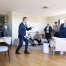 Auctioneer Clarence White in action at 25/40 Maria Street, Petersham.