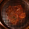 This cosy Japanese-Korean cook-your-own grill house channels campfire vibes in the city