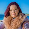 After starting a relationship with Stan Grant, Holmes says she had a “rude awakening” to the issues of race in Australia.