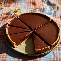 Use your favourite type of chocolate for the ganache, which cloaks the caramel.