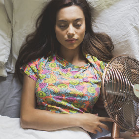Journalist Serena Coady demonstrates the real way to sleep with a fan.