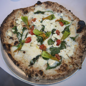 Glorietta's fiori di zucca pizza with mozzarella, zucchini, spinach and cherry tomatoes. 