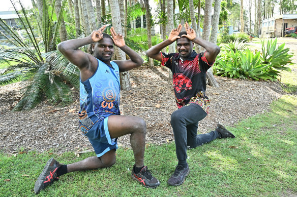 The Abbott brothers with a nod to Taree icon Latrell Mitchell.