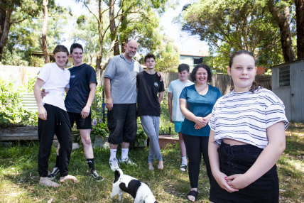 Nervous but happy: Marlie Sinclair, 11, right, pictured with her parents and four brothers, is due for her first COVID-19 vaccination on Monday. 