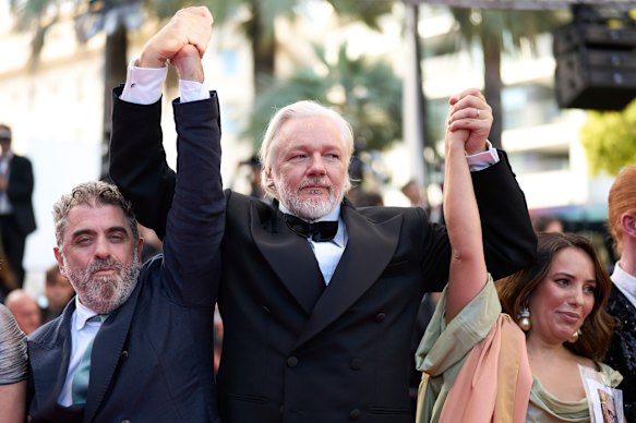Eugene Jarecki, Julian Assange and Stella Assange at the Cannes Film Festival.