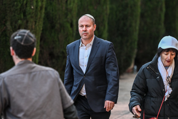 Former treasurer Josh Frydenberg arrives at a Jewish community rally in Melbourne.