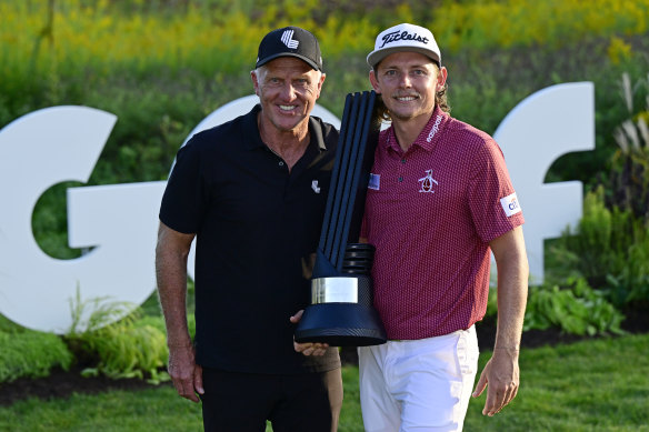 Cameron Smith with LIV Golf chief executive Greg Norman after his win in Chicago.