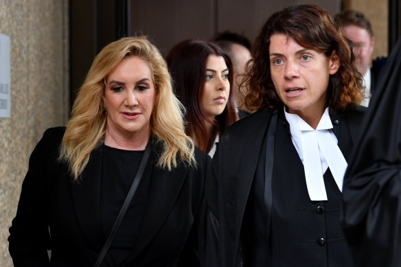 Gina Edwards (left) leaves court on Monday with her barrister Sue Chrysanthou, SC.