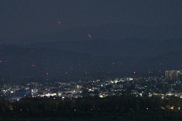 Streaks of light illuminate the sky as India accused Pakistan of violating a ceasefire deal made hours earlier.