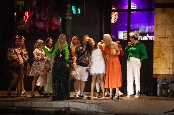 The more things change, the more they stay the same. Crowd outside the Empire Hotel in September.