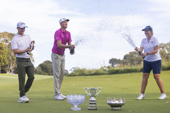 Kipp Popert, Adrian Meronk and Ashleigh Buhai celebrate after winning the 2022  Australian Open.