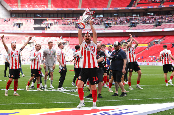 Bailey Wright celebrates Sunderland’s promotion to the English Championship after beating Wycombe Wanderers 2-0 at Wembley.