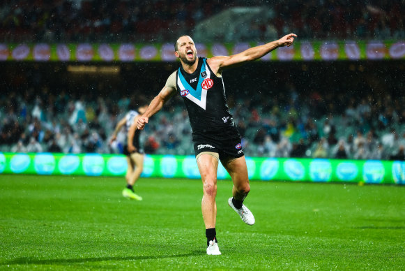Got the Power: Port Adelaide's Travis Boak celebrates a goal. 