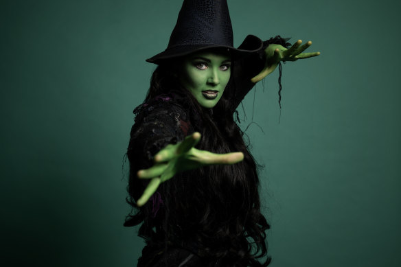 Sheridan Adams stars as Elphaba the green witch in Wicked, at Sydney’s Lyric Theatre.  