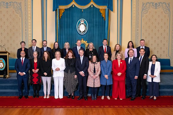 The new ministry pose for a photo at Government House.