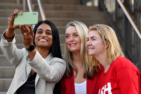 Ash Ambihaipahar, running for Oatley last year, takes a selfie with the prime minister’s fiancee Jodie Haydon and the premier’s wife Anna Minns.