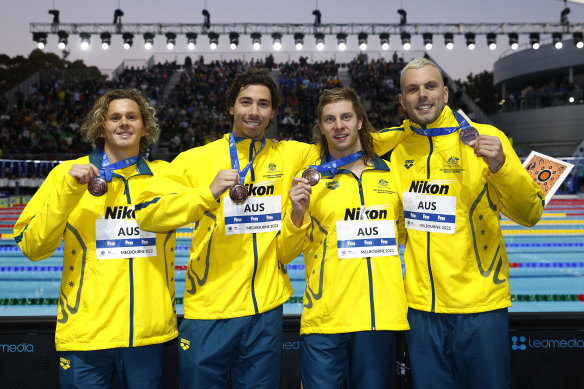 Bronze medallists Isaac Cooper, Grayson Bell, Matthew Temple and Kyle Chalmers of Australia pose during the medal ceremony for the men’s 4x50m medley relay final. 