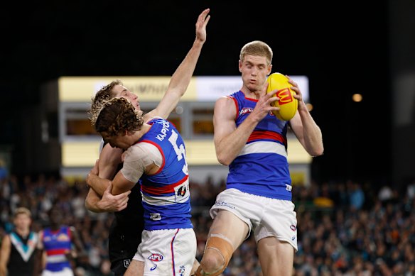 Tim English takes a grab against the Power.