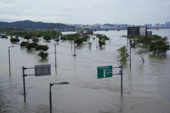 Two days of record-breaking rain have caused widespread floods in Seoul, South Korea.