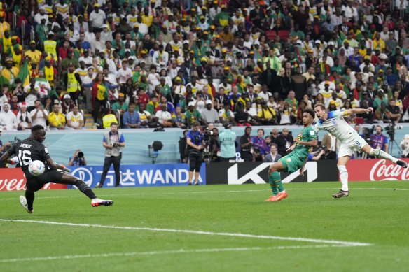 Harry Kane scores England’s second goal against Senegal.
