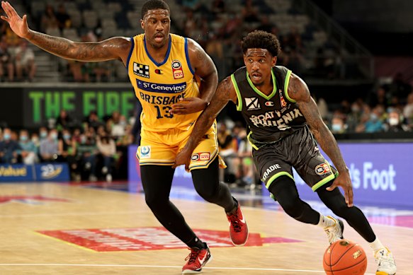 Xavier Munford of the Phoenix is all concentration against the Brisbane Bullets.