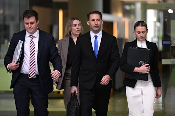 Robert Crawford (centre) is on trial, accused of murdering his wife.
