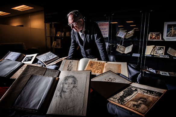 Robert Holden inspects some of the newly discovered material.