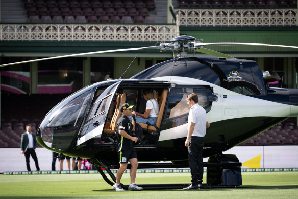 David Warner arrives at the SCG on a helicopter for the “Sydney Smash” BBL match.