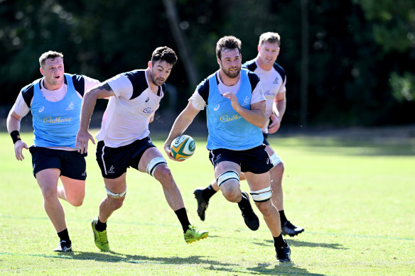 Nick Frost breaks away at Wallabies training.