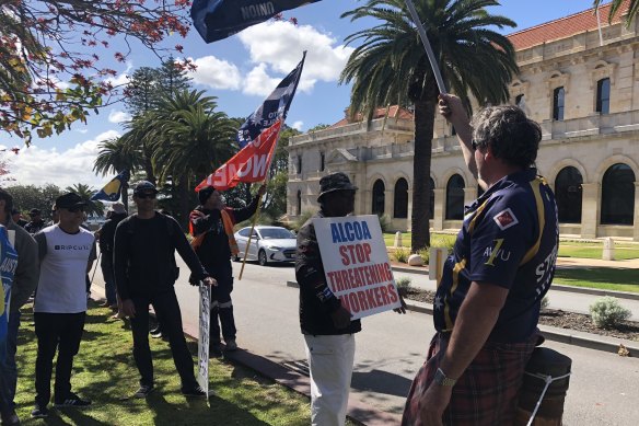 Striking unionists outside parliament house.