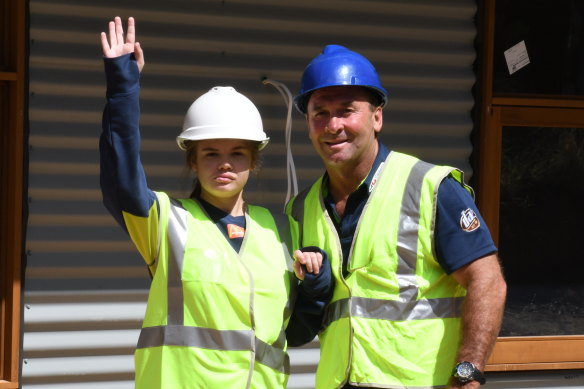 Ricky Stuart with daughter Emma at construction of the new respite centre.