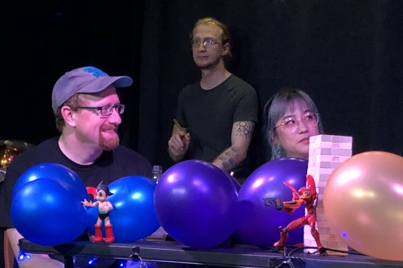 From left, Euan Bowen (player and former Master of Dungeons), Jack Collins (bard), Helen Luan (player) at <i>Roll for Intelligence</i>.
