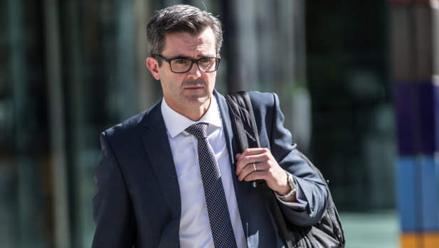 NAB's Anthony Waldron arrives at the banking royal commission on Tuesday.