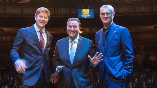 Comedy Theatre owner Jason Marriner, left, with Tourism Minister John Eren, centre, and producer Rodney Rigby.  