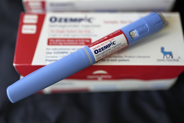 The injectable drug Ozempic is displayed, July 1, 2023, in Houston. Federal regulators are challenging patents on 20 brand name drugs, including the blockbuster weight-loss injection Ozempic, in the latest action by the Biden administration targeting industry practices that drive up pharmaceutical prices.