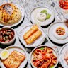 A spread including house-made pita, burrata, white bean hummus, mortadella and basturma.